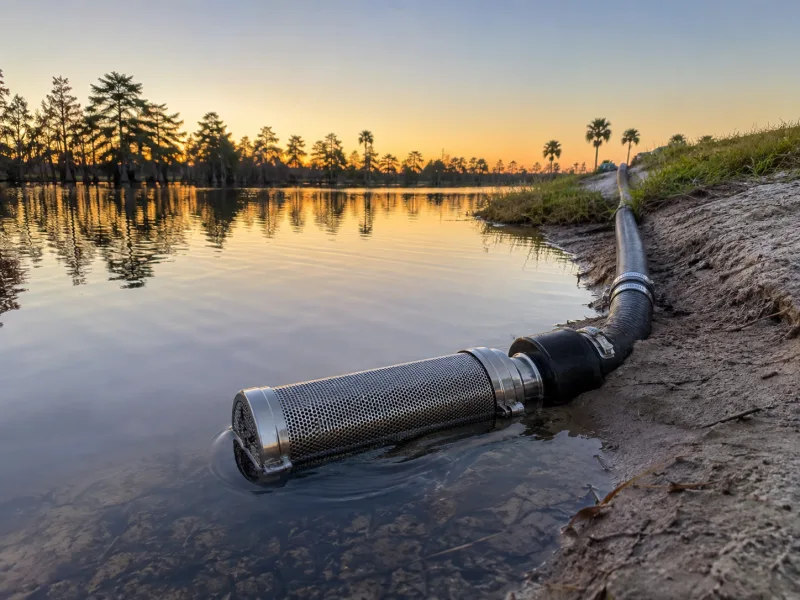 Screened lake intake feeding a waterfront irrigation system